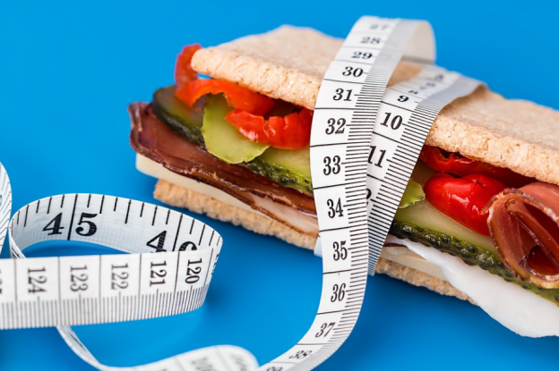 a healthy sandwich and a body meter